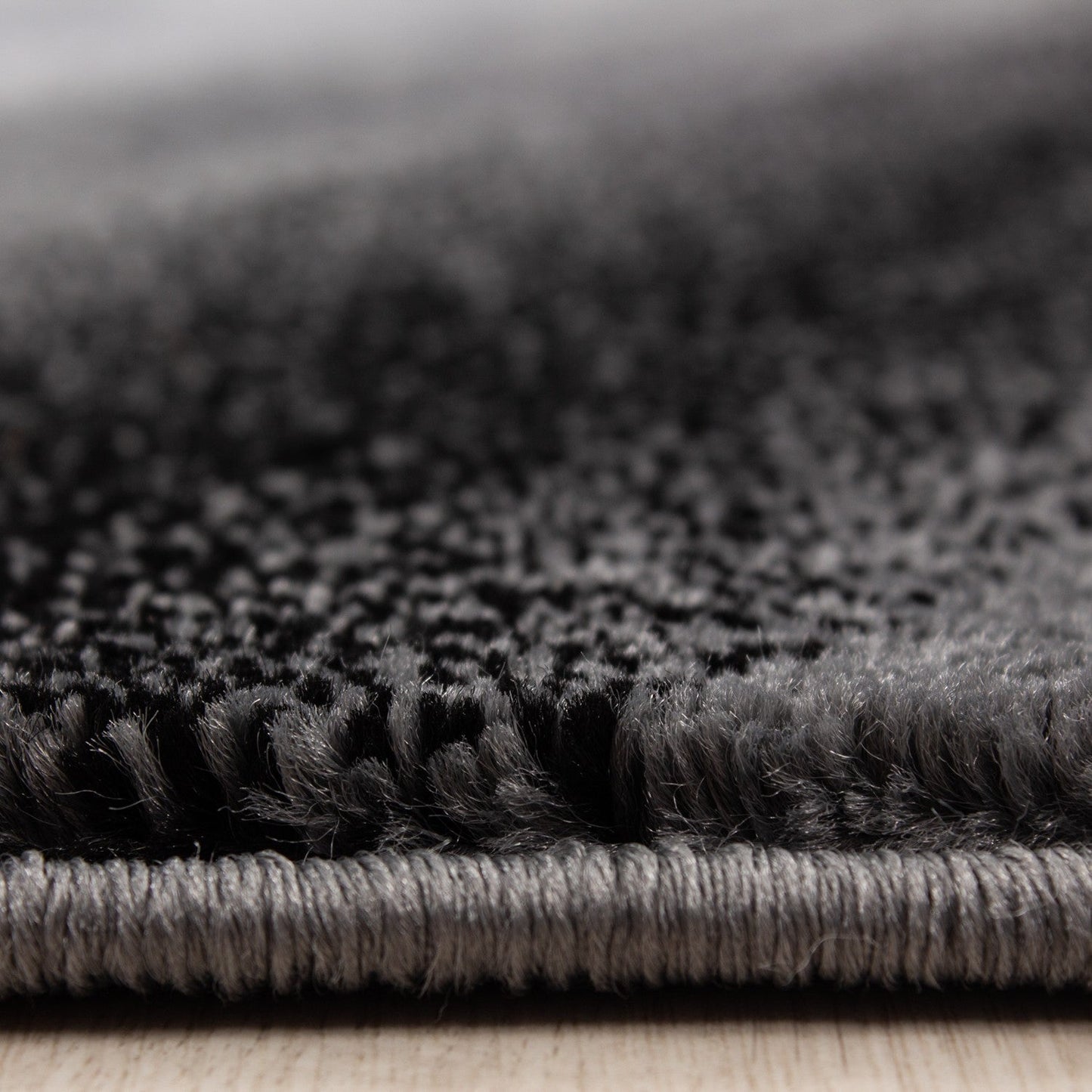 Moderner Designer Wohnzimmer Teppich Wellendesign Miami 6630 Schwarz-Grau