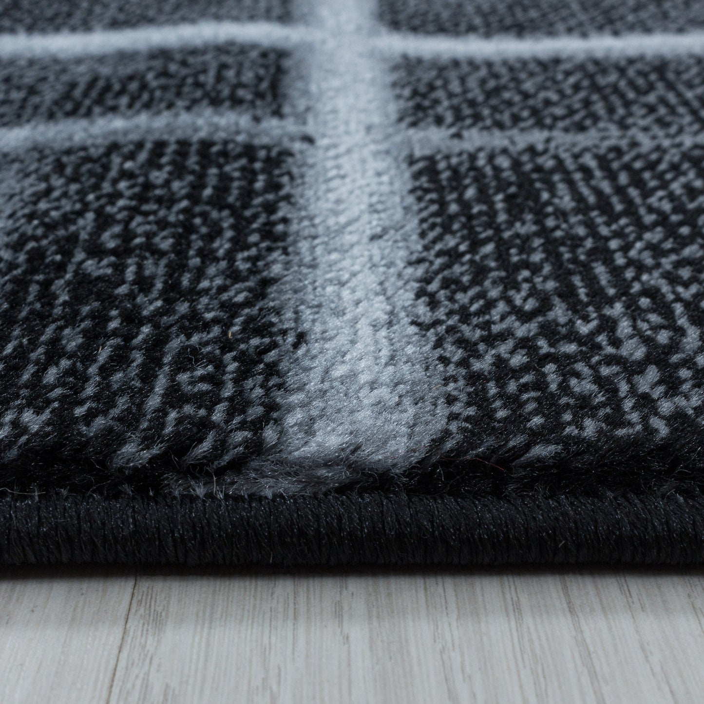 Wohnzimmerteppich Kurzflor Teppich Gitter Design Muster Soft Flor Schwarz