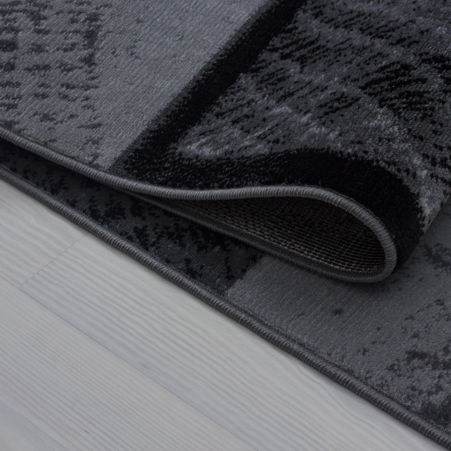 Moderner Designer Wohnzimmer Teppich kariert Wellenmotiv Plus 8003 Schwarz